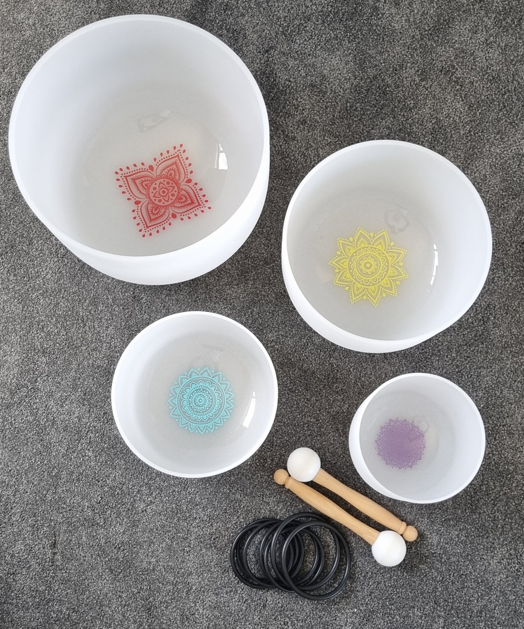 Set of 4 White Crystal Quartz Singing Bowls with Symbols – Source 88