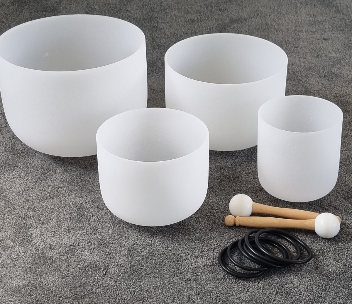 Set of 4 White Crystal Quartz Singing Bowls with Symbols
