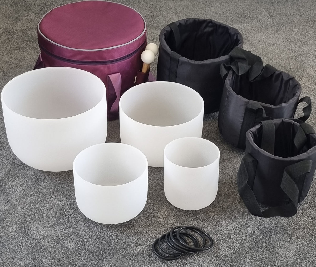 Set of 4 White Crystal Quartz Singing Bowls with Symbols